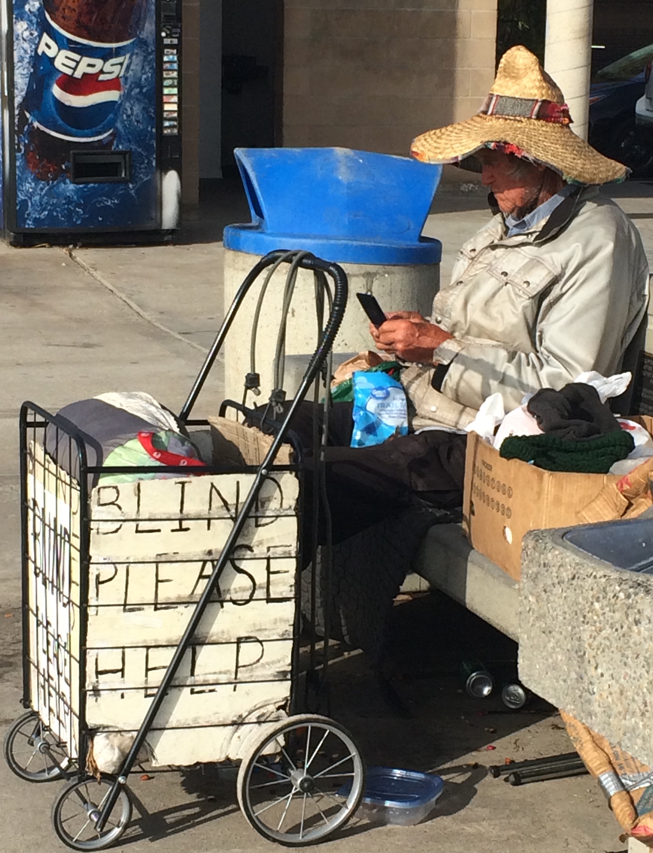 BLIND Man on a cell phone
